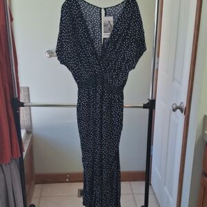 Polka Dot V-Neck Jumpsuit in Black and White